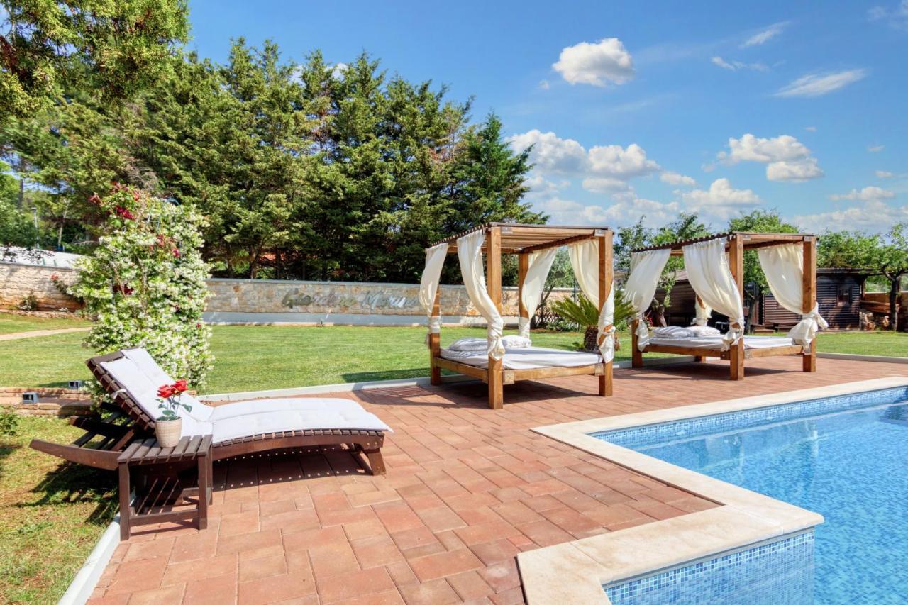 Holiday Home Giardino Marino Pomer Exterior photo